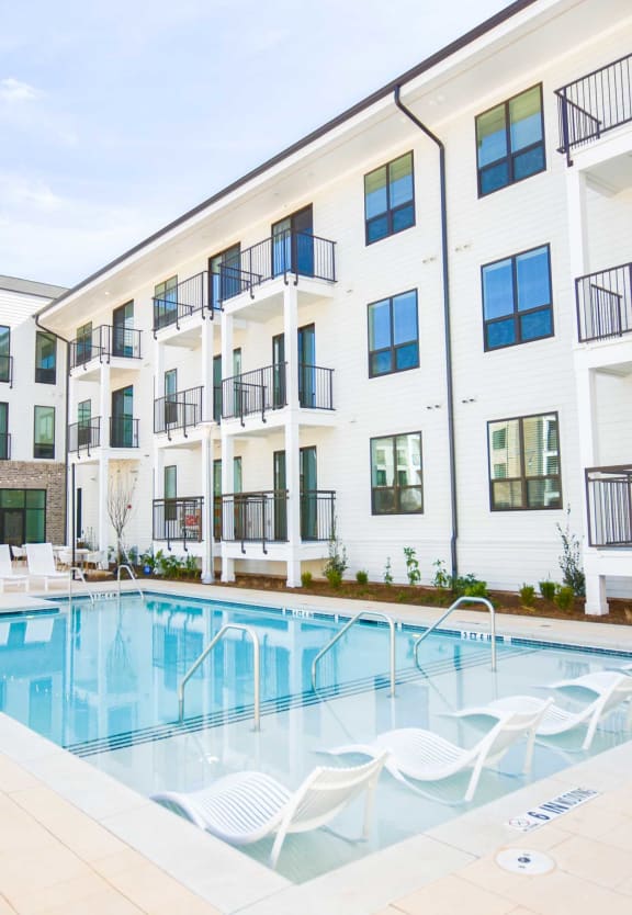 Modern swimming pool with lounge at The Maven, Georgia