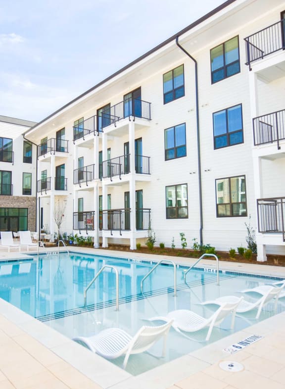Modern swimming pool with lounge at The Maven, Georgia