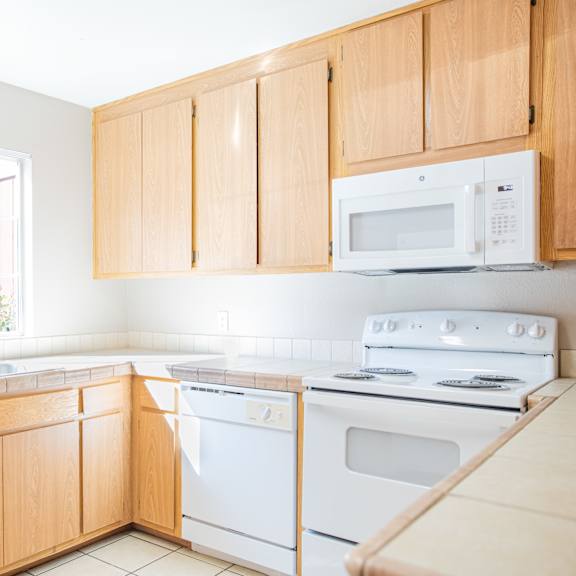 Fully Furnished Kitchen at OSM Properties Homes & Apartments, California