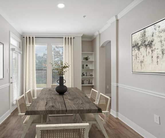 a dining room with a wooden table and chairs at The Verandah, Texas, 78726