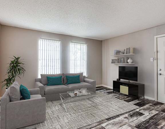 a living room with a couch and a coffee table