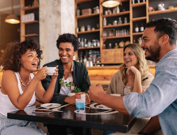 a group of people sitting at a table in a restaurant  at Nineteen North, Buffalo, NY 14202
