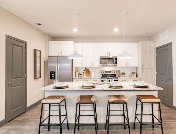 Gourmet Kitchen With Island at Harrison Apartments, Sarasota, FL