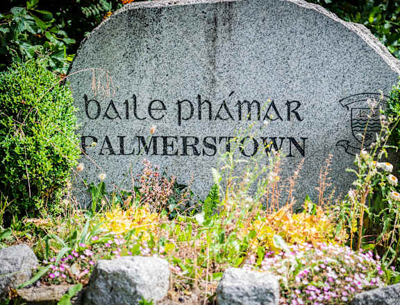 a large stone with the words batelepharma palmerstown engraved on it