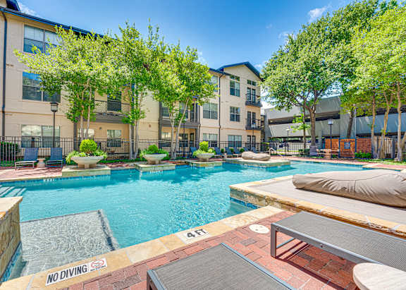 Pool side patio at The Bowen on Henderson Apartments, Dallas, TX, 75206