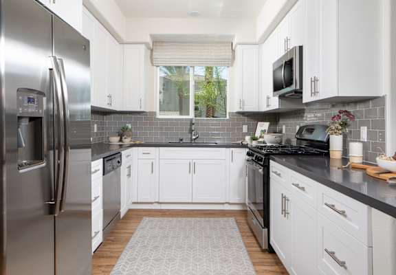 Kitchen with Stainless Steel GE Appliances  at Sorano Apartments, Moreno Valley  at Sorano Apartments, Moreno Valley, 92557