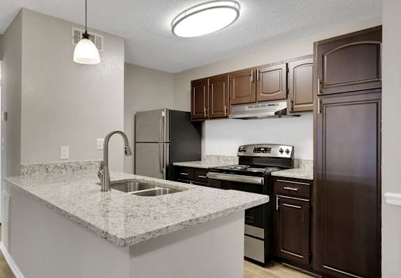 Renovated Kitchen With Stainless Steel Appliances