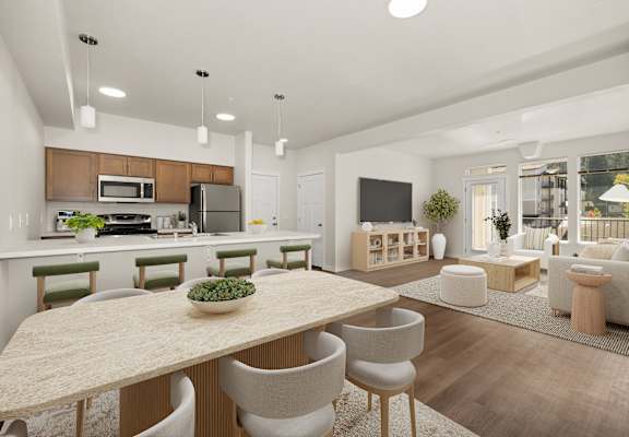 A modern kitchen with a dining table and chairs.