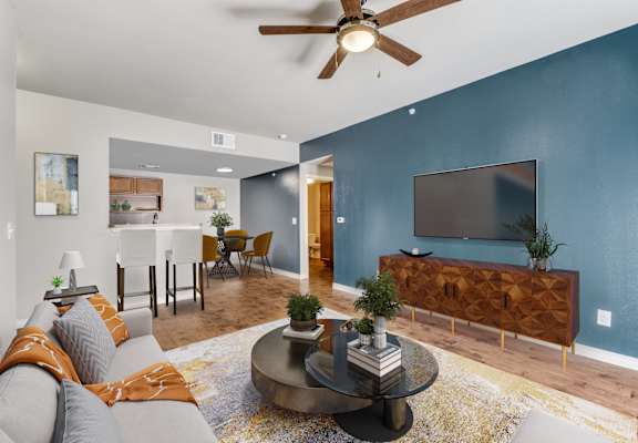 a living room with a couch and a coffee table  at Valor at Harlingen, Harlingen, TX, 78552