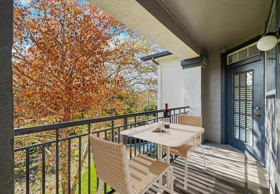 Private Balcony With Seating at Crowne Chase Apartment Homes, Overland Park, KS, 66210