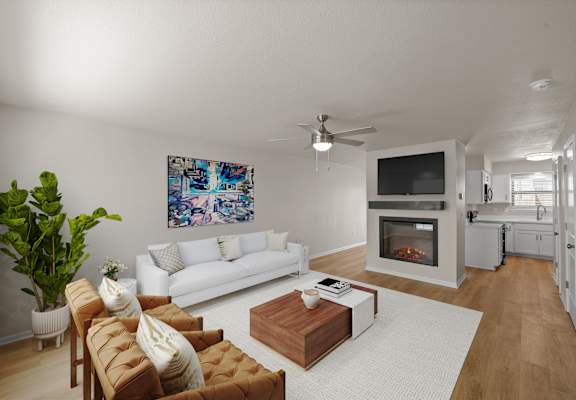 A living room with a white couch, a wooden coffee table, and a painting on the wall.