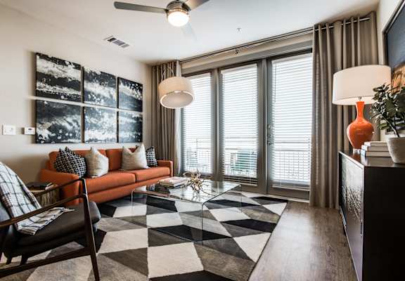 Centric One90 Apartments Model Living Room and Balcony Door