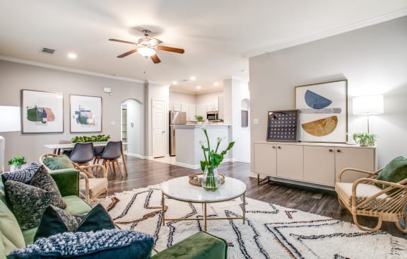 a living room with furniture and a ceiling fan at The Atlantic Stone Oak, San Antonio, 78260