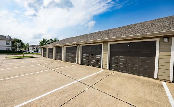 a row of garage doors on a house