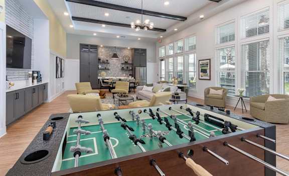a game table in the middle of a living room