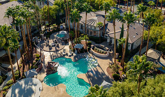 an aerial view of the pool and amenities at the resort