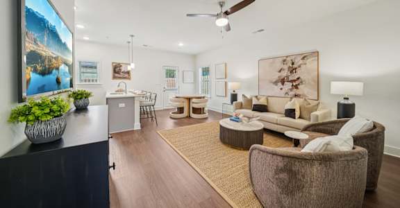 Open concept living room and kitchen Magnolia floor plan Turnberry Park in Gardendale, AL