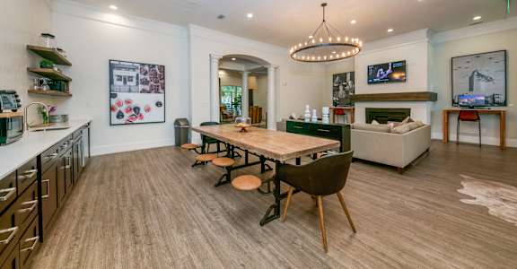 a dining room and living room with a table and chairs at Sunrise Canyon, Universal City, TX, 78148