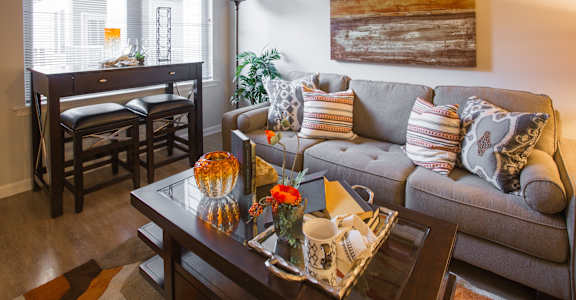 a living room with a couch and a table