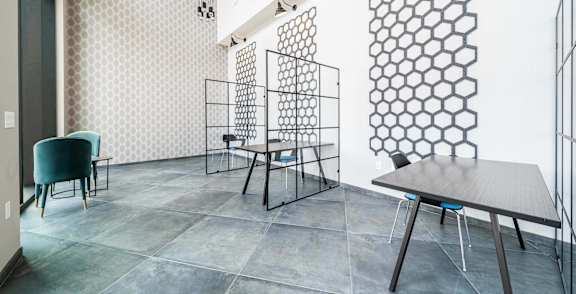A dining room with a table and chairs at Crossroads 389 Apartments, New Jersey, 07601