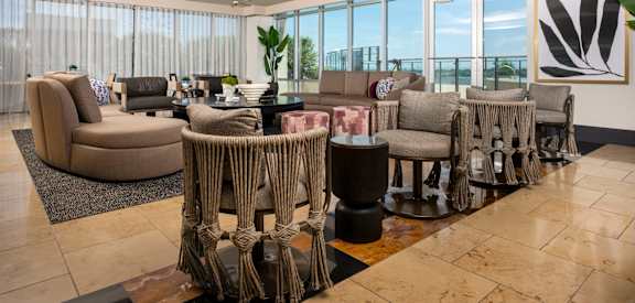 Clubroom with lounge seating at The Heights at Park Lane, Dallas, Texas