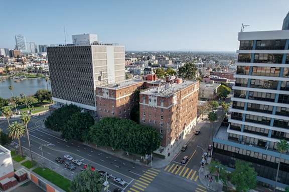 A city street with cars and buildings.at Park Wilshire, Los Angeles, 90057