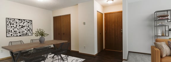 Grand Forks, ND Harrison and Richfield |a dining room and living room with a table and chairs