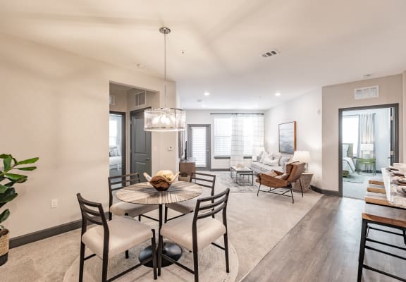 Wood style flooring and open floor plans at Harrison Apartments, Sarasota, FL, 34243