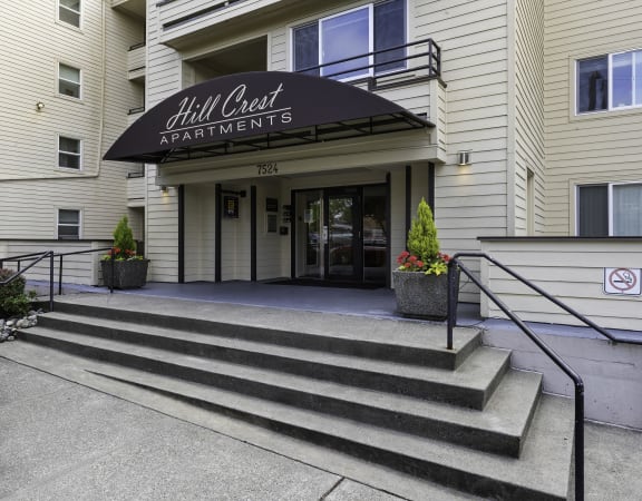 a view of the entrance to the all clear apartments at Hill Crest Apartment Homes, Seattle