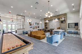Club Room with Shuffleboard Table at Cedar Heights Luxury Apartments in Austin, TX