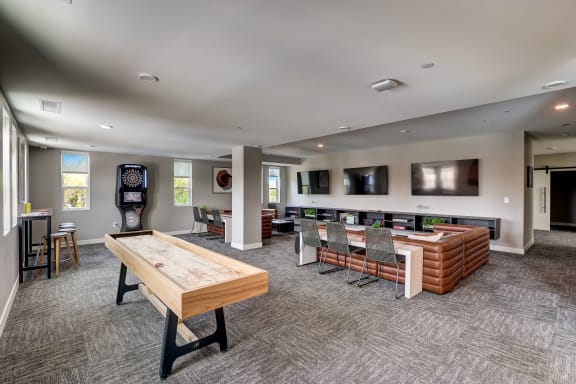 the reserve at bucklin hill clubhouse with shuffleboard table
