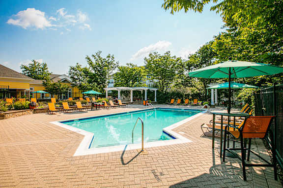 Pool surrounded by chairs1 at Broadlands Apartments, Ashburn