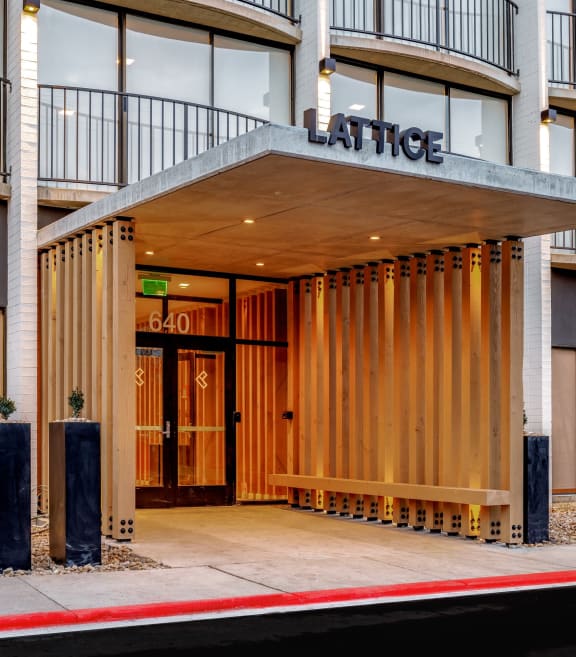 a building with a wooden door and a sign that reads lakeside on top of it