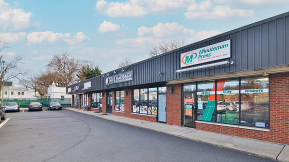 the front of a store on the side of a street