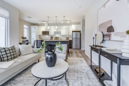 a living room with a couch and a table