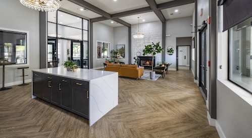 A Large Living Room With Fireplace at Odyssey Apartments, Albuquerque, NM