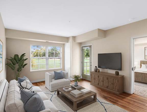 a living room with a couch and a tv