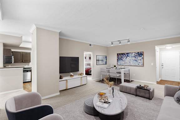 a living room with a couch and a table