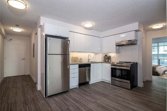 Kitchen with Stainless Steel Appliances and White Cabinets