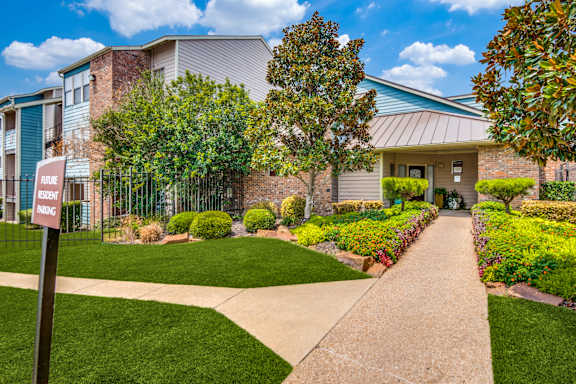 A residential area with a sign that says "Residential Housing".