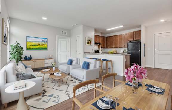 A living room with a grey chair and a wooden table.