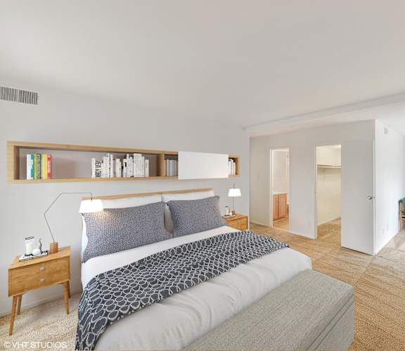 a bedroom with a bed and a desk and a living room at The Forest, Rockville, MD 20851