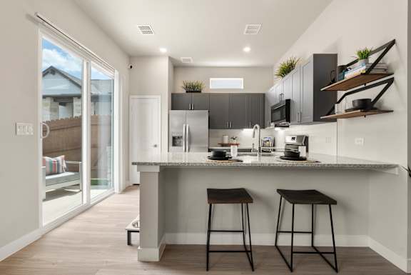 Gourmet Kitchen with Island at Avilla Berry Creek Highlands, Georgetown, TX 78633