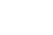 A green sign with white letters that says Patriot Pointe Townhomes.