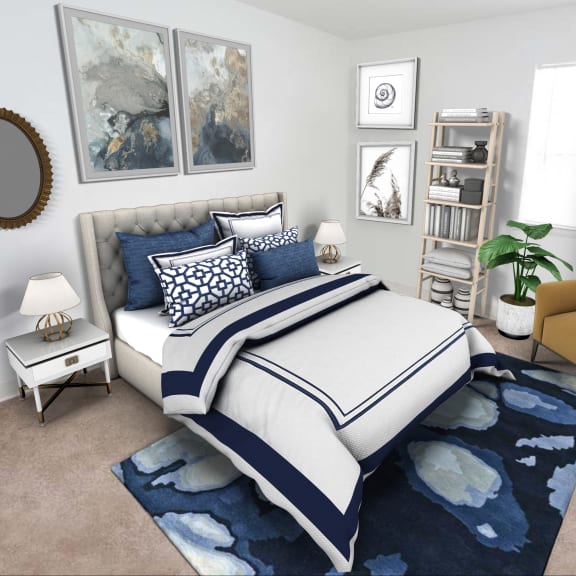 a bedroom with blue and white bedding and a blue rug