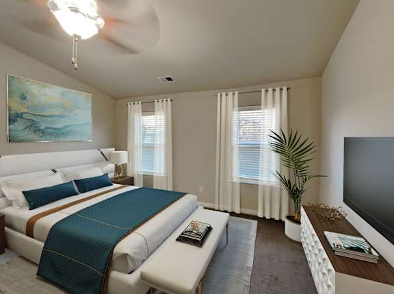 an image of a bedroom with a bed and a tv