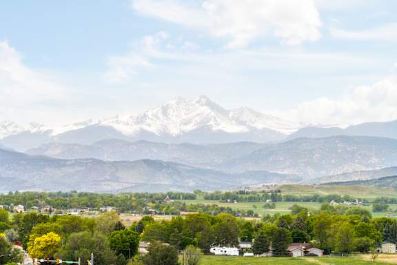 a view of the mountains in the distance from a field at Notch66, Longmont, Colorado
