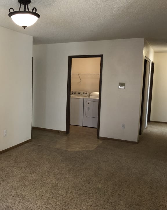 Carpeted Living Space at Royal Oaks Apartments, North Dakota, 58103