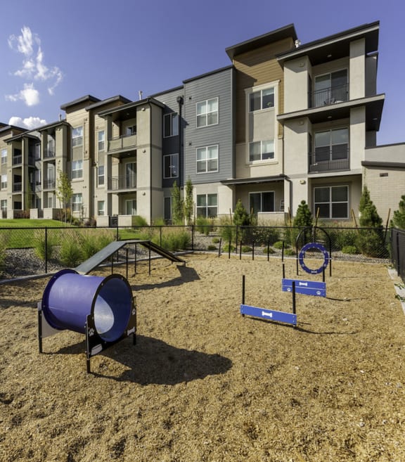 Dog Park with Agility Course at Parc Ridge Apartments in Riverton, Utah