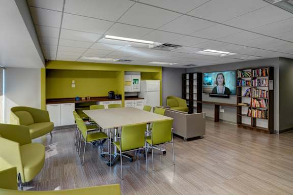 Community Room with TV and Library.